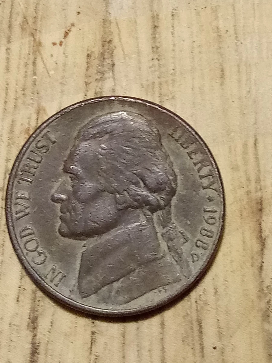 1988 nickel broadstrike error showing expanded diameter and thinner profile compared to standard nickel